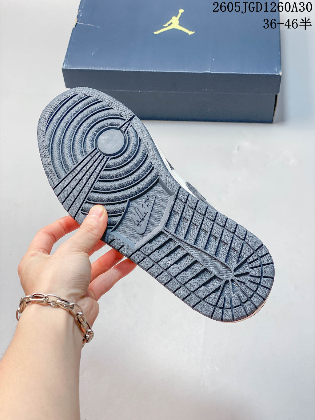 Close-up of the patterned outsole on a Jordan low-top sneaker