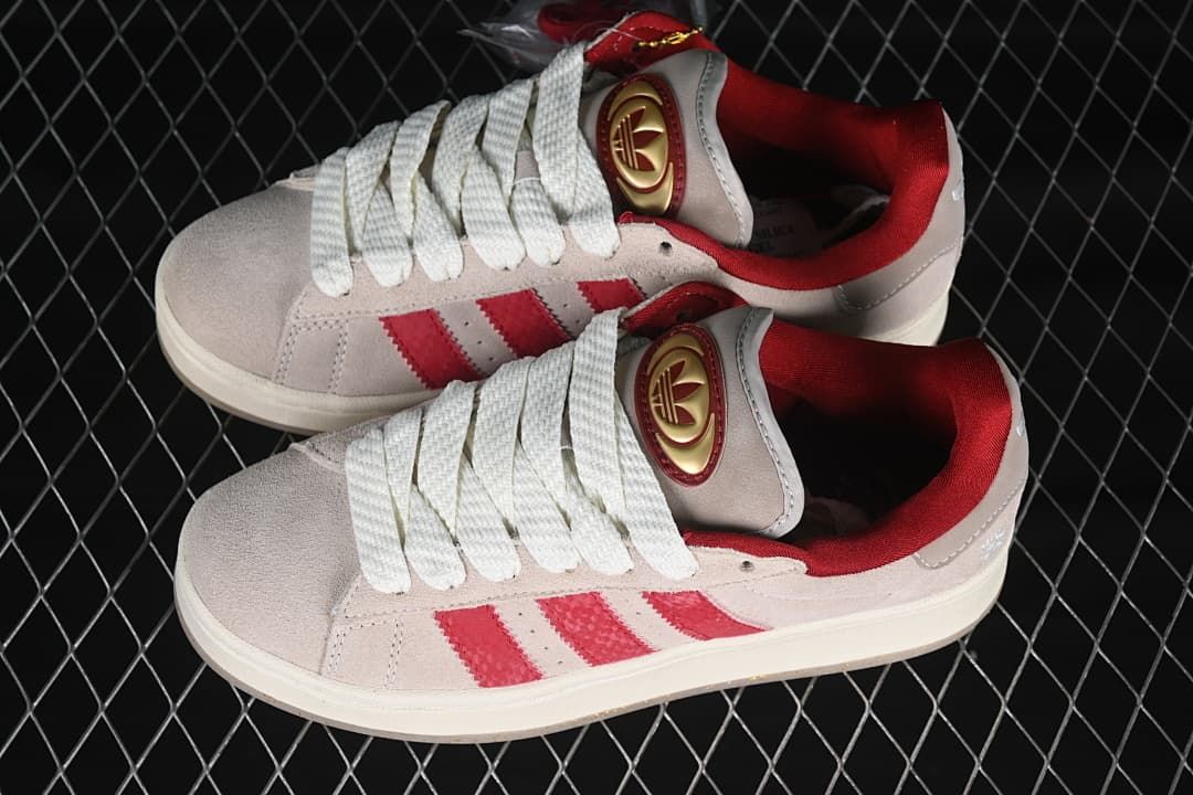 Pair of light neutral and red Campus sneakers viewed from above
