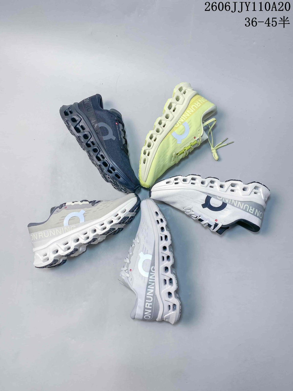 Five On running shoes arranged in a circle, shown in gray, navy, white, and pale yellow-green colorways