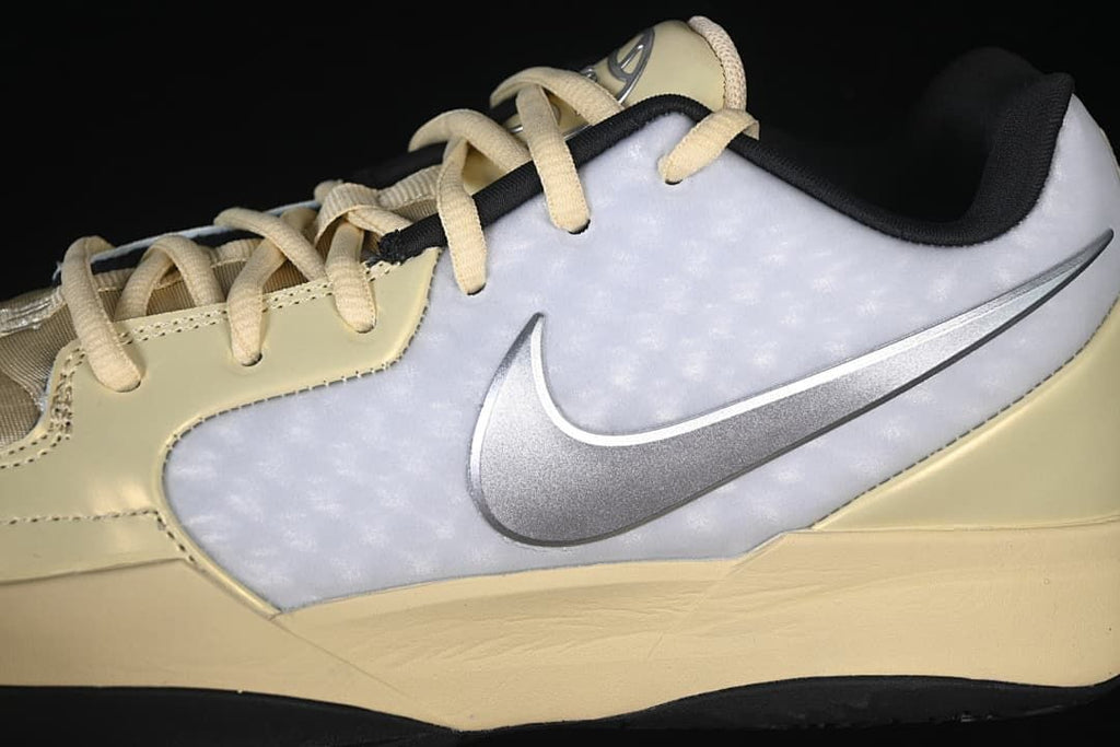 Close-up of silver Swoosh on the white side panel