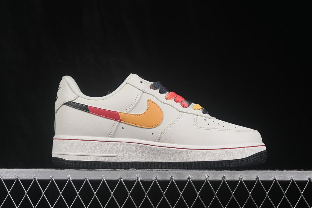 Side profile of the white low-top sneaker with multicolor Swoosh detailing and a black outsole.