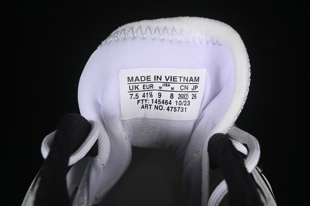 Close-up of the shoe tongue label showing size information and article number 475731.
