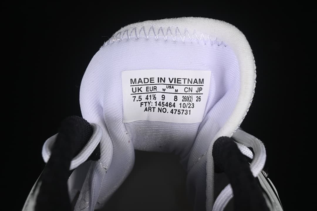 Close-up of the shoe tongue label showing size information and article number 475731.
