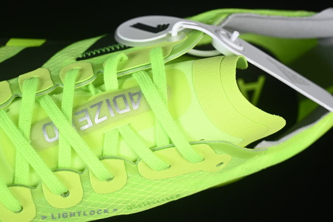 Close-up of laces, tongue and patterned upper