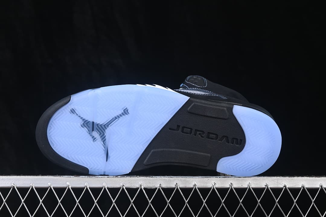 Outsole view showing translucent blue sections and a dark center.